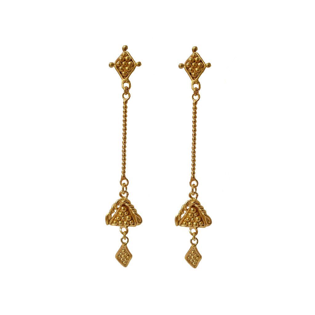 Golden romanesque earrings in gold. Displayed on a white background